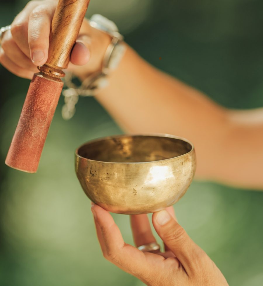 tibetan-singing-bowl-in-sound-healer-hands_Lightroom